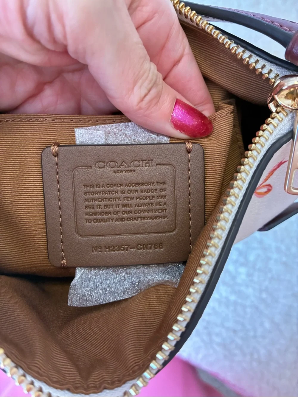 Coach Cream Crossbody with Coral Floral & Bow Print